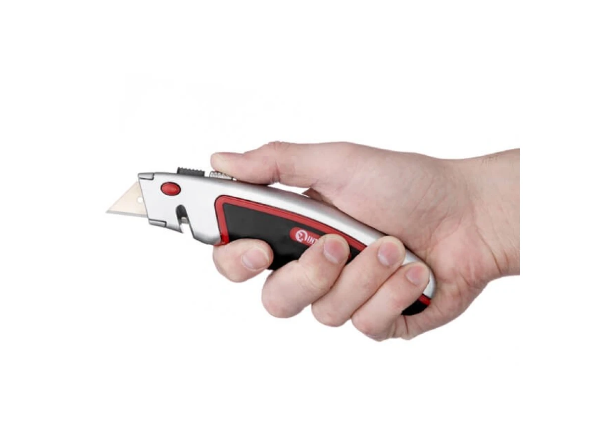 Ніж з висувним трапецієподібним лезом, металевий корпус, прогумований INTERTOOL HT-0516 