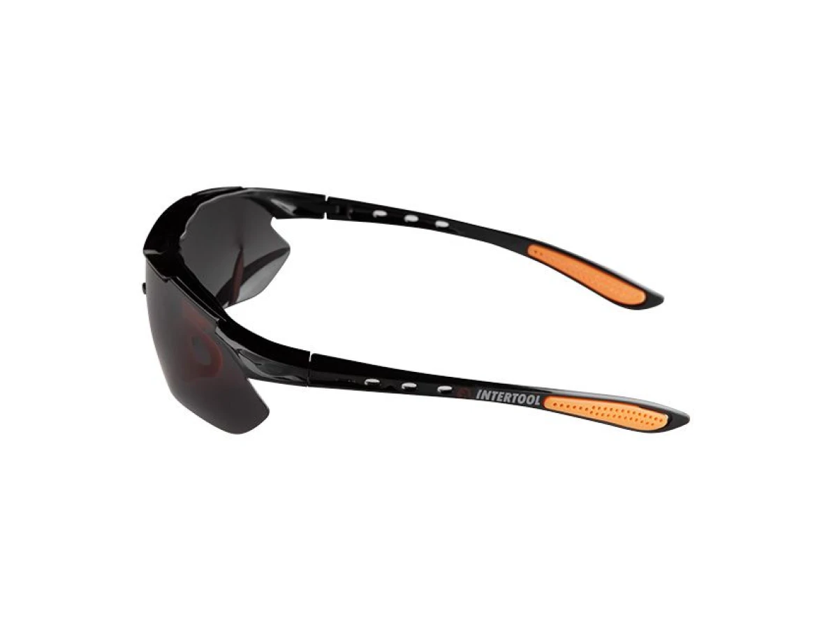Очки защитные затемненные, материал линз поликарбонат, заушины черного цвета, материал нейлон, резиновая накладка для носа, защита от удара INTERTOOL 
