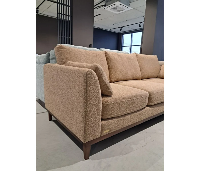 Прямий диван із тканини букле в комплекті з пуфом