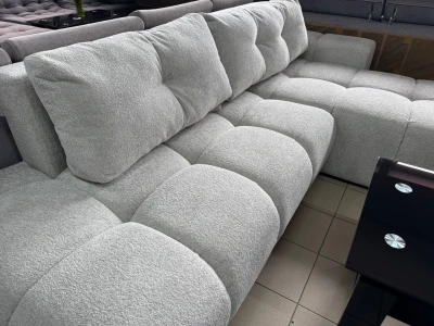 Стильний кутовий модульний диван у фактурній тканині