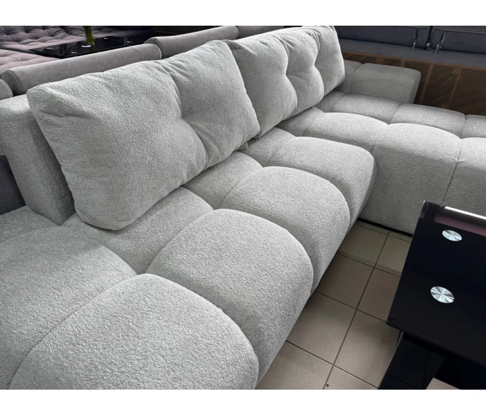 Стильний кутовий модульний диван у фактурній тканині