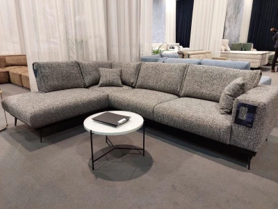 Двухсекционный диван с фактурной обивкой