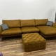Гірчичний кутовий диван з великим плетеним пуфом