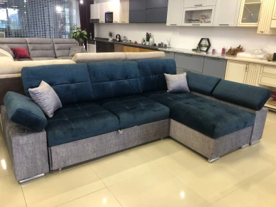 Великий кутовий диван у смарагдово-синьому відтінку