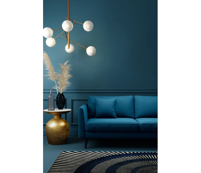 М'який синій диван з велюровою оббивкою