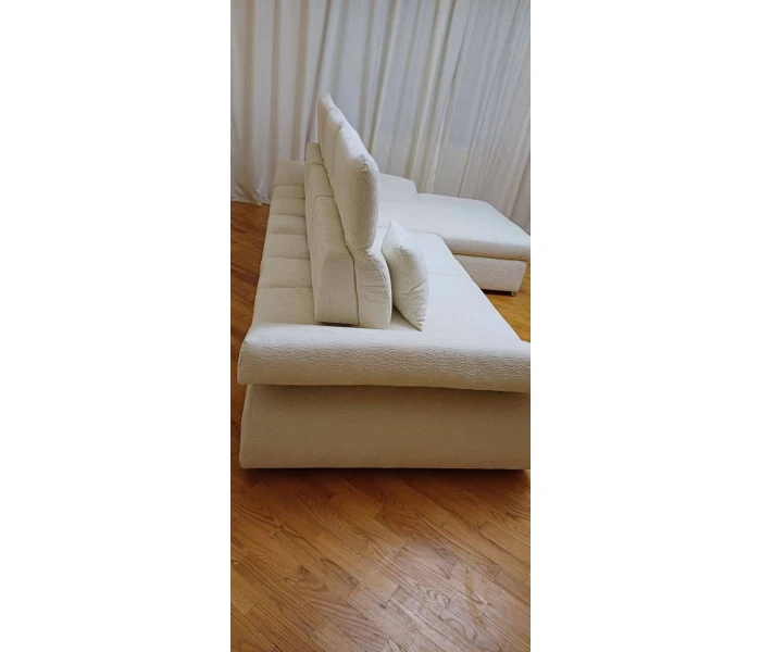 Кутовий диван-ліжко білий з підйомними підголівниками