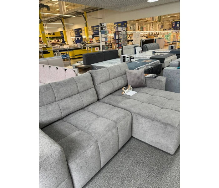 М’який кутовий диван з об’ємною квадратною стяжкою