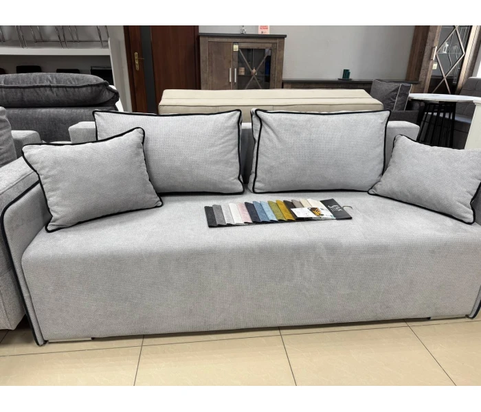 Прямий розкладний диван з контрастним чорним кантом