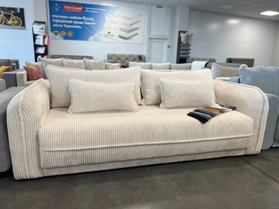 Прямий диван з круглими підлокітниками та декоративним кантом