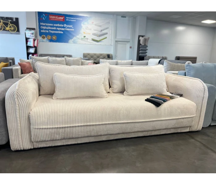 Прямий диван з круглими підлокітниками та декоративним кантом