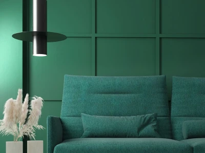 Зеленый диван с высокой спинкой и горизонтальной прострочкой