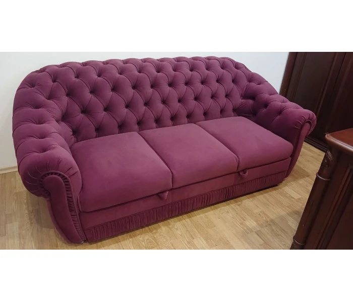 Оновлення класичного дивана з каретною стяжкою