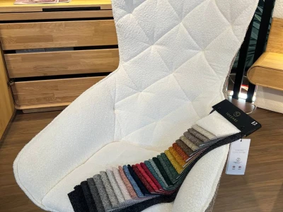 Акцентне крісло-лежанка з каретною стяжкою