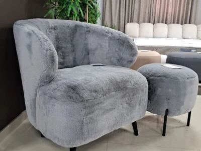 Пухнасте крісло-кокон з округлими формами