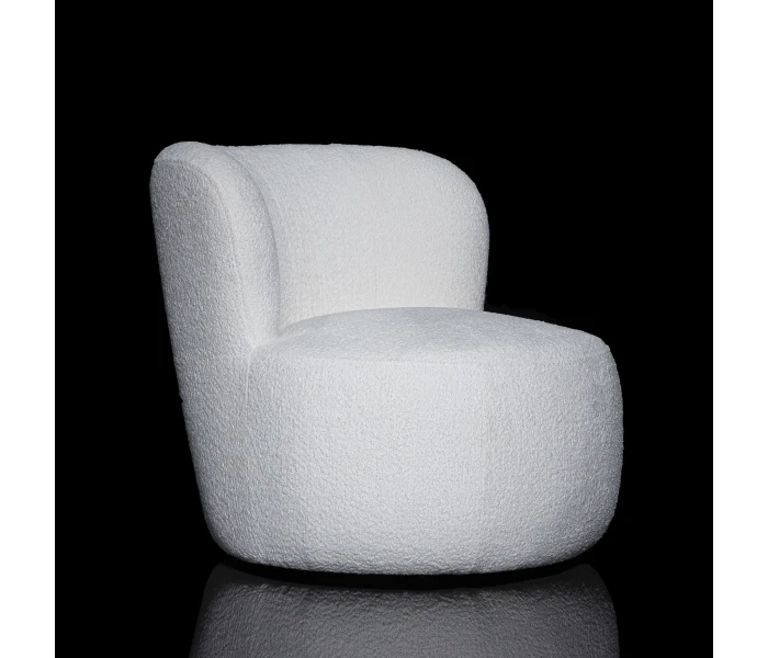 Круглое мягкое кресло с изогнутой спинкой