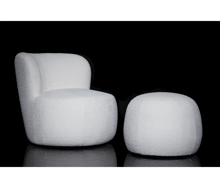 Круглое мягкое кресло с изогнутой спинкой