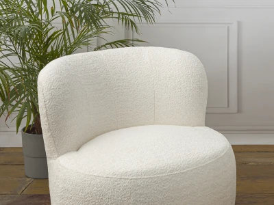 Кругле м'яке крісло з вигнутою спинкою