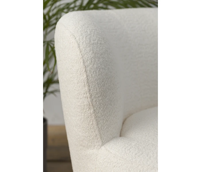 Круглое мягкое кресло с изогнутой спинкой