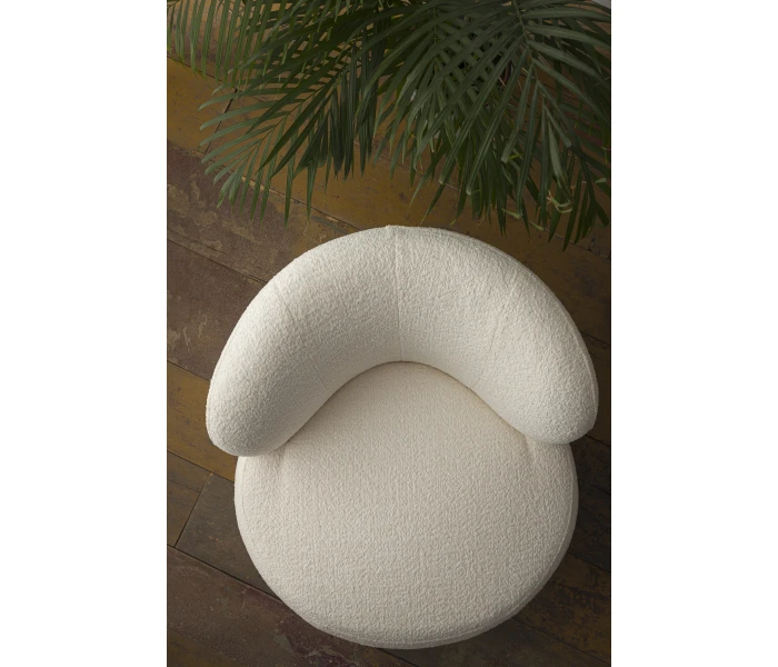 Круглое мягкое кресло с изогнутой спинкой