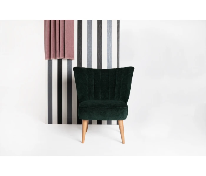 Дизайнерське крісло-мушля глибокого зеленого кольору