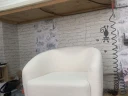 Лаунж-кресло округлой формы в белоснежном букле