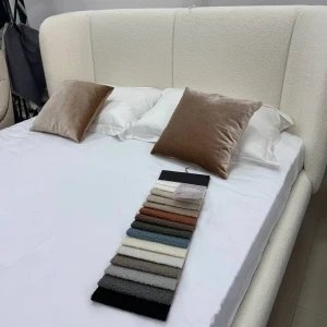 Ліжко з високим об'ємним узголів'ям радіусної форми