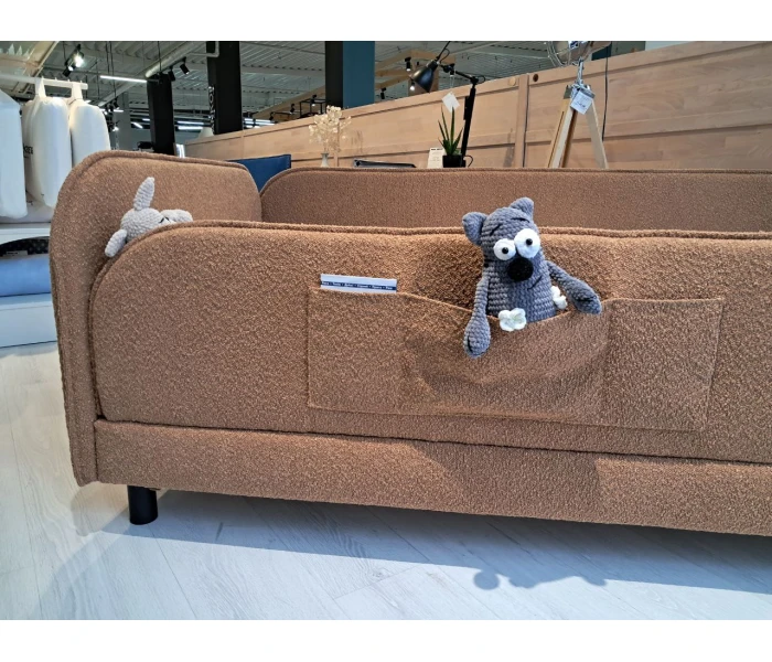 Дитяче ліжко з бічними огорожами