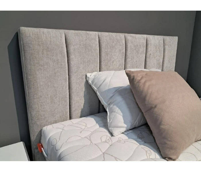 Полутороспальне ліжко з вертикальною стяжкою