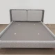 Серая кровать с двухсекционным изголовьем